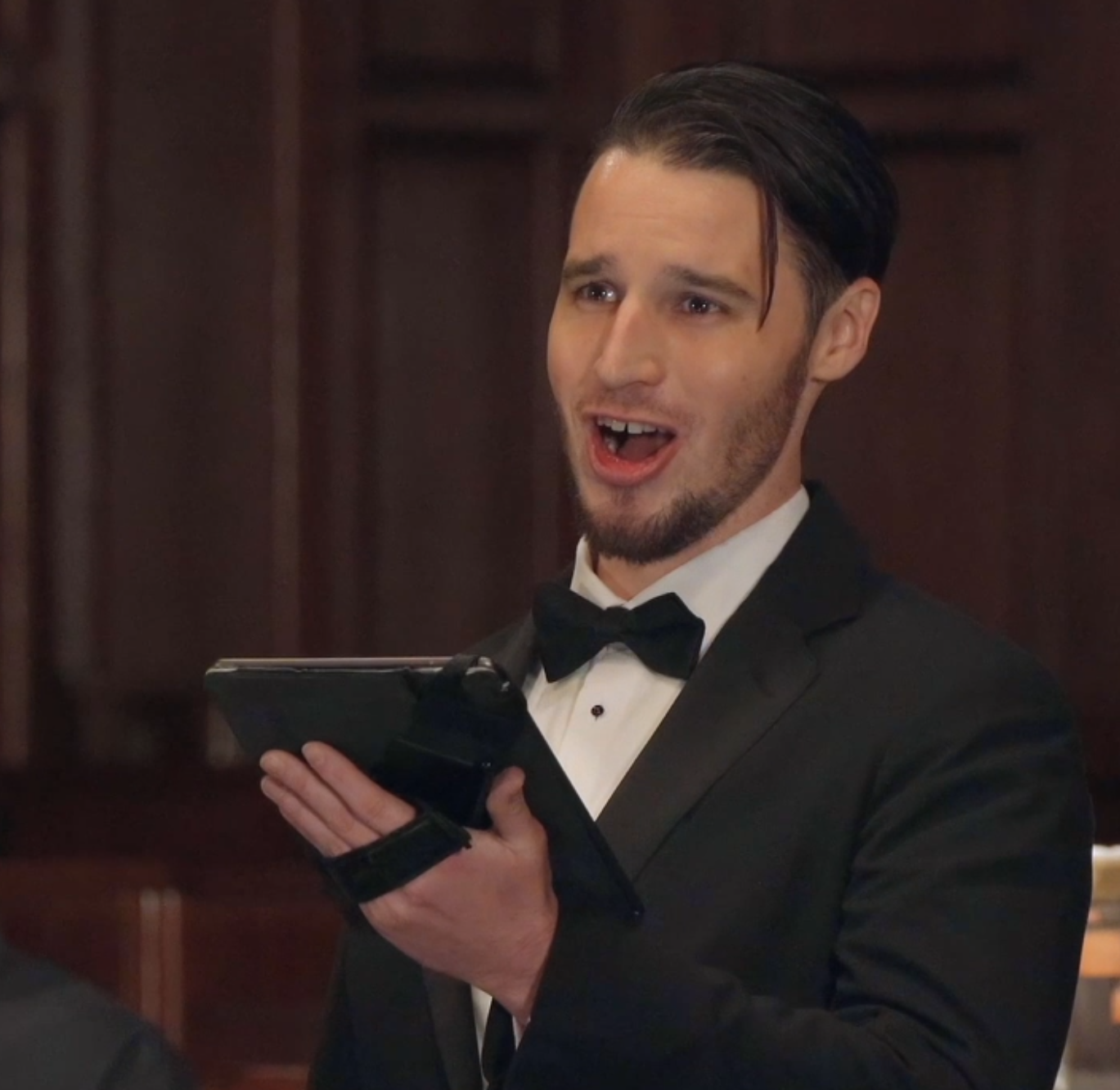 Gabe Salmon singing in performance